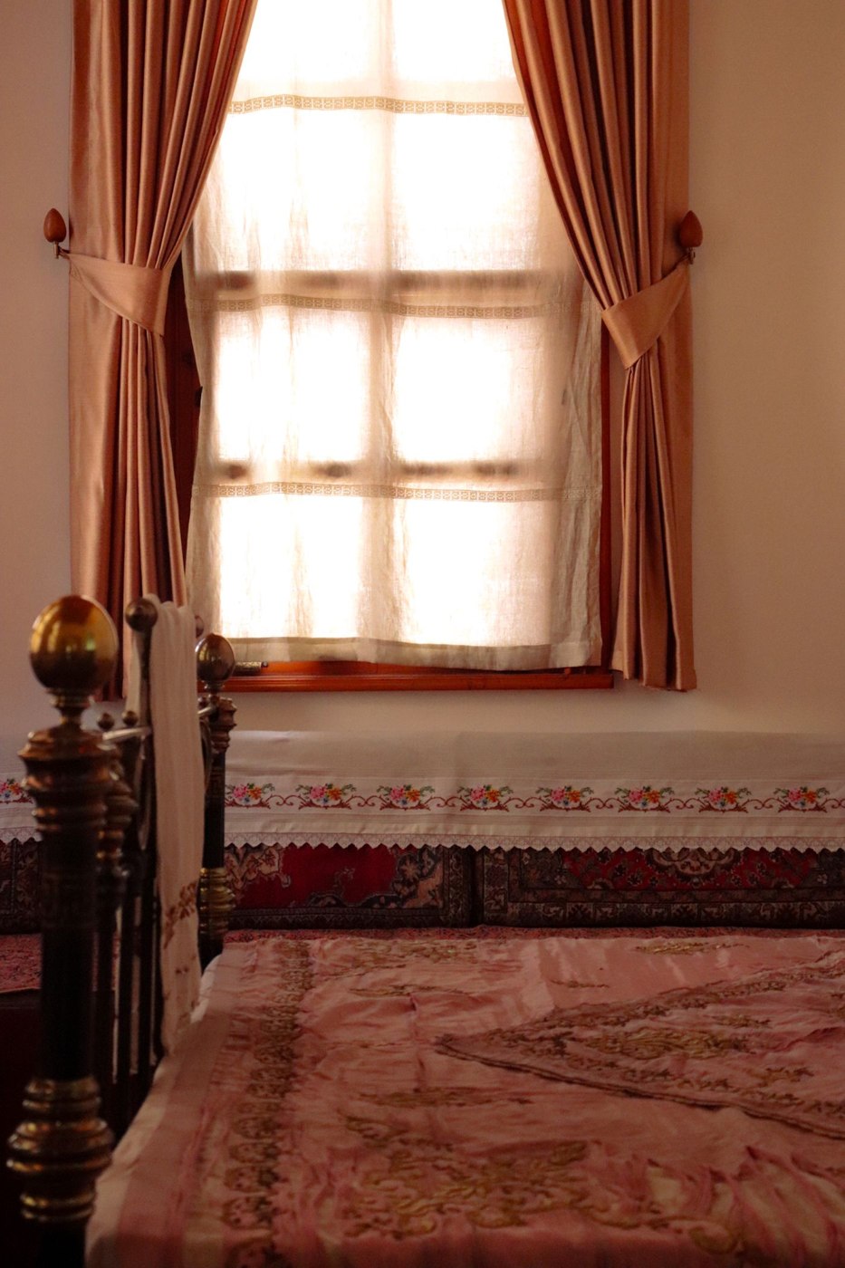 Cozy Bedroom with Sunlit Curtains