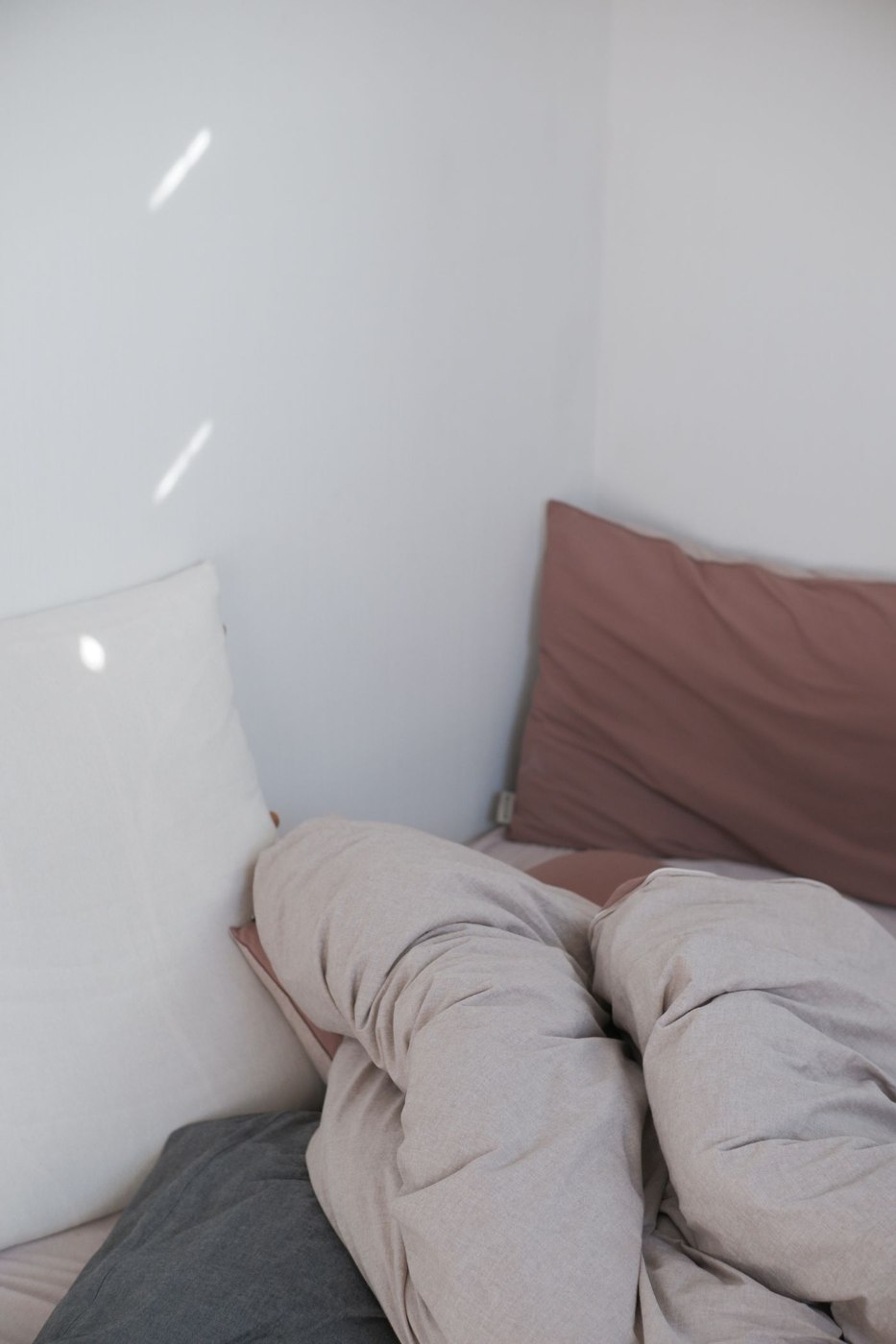 Blankets and Pillows on a Bed