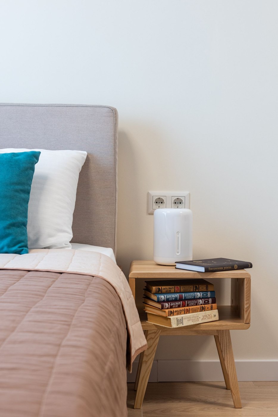 Stack of Books Placed in a Bedside Table