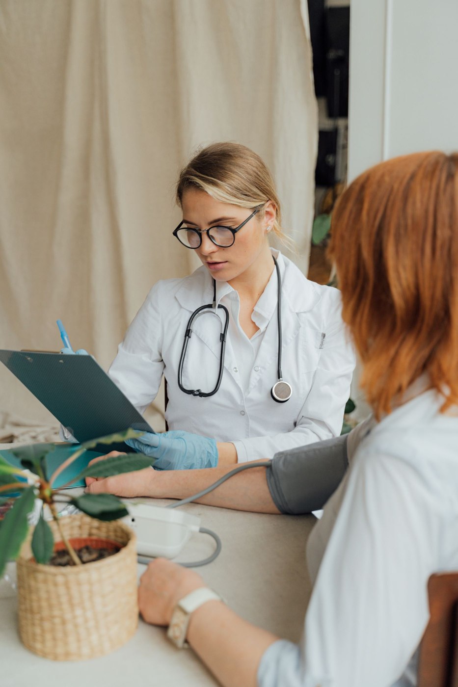 A healthcare professional talking with a patient