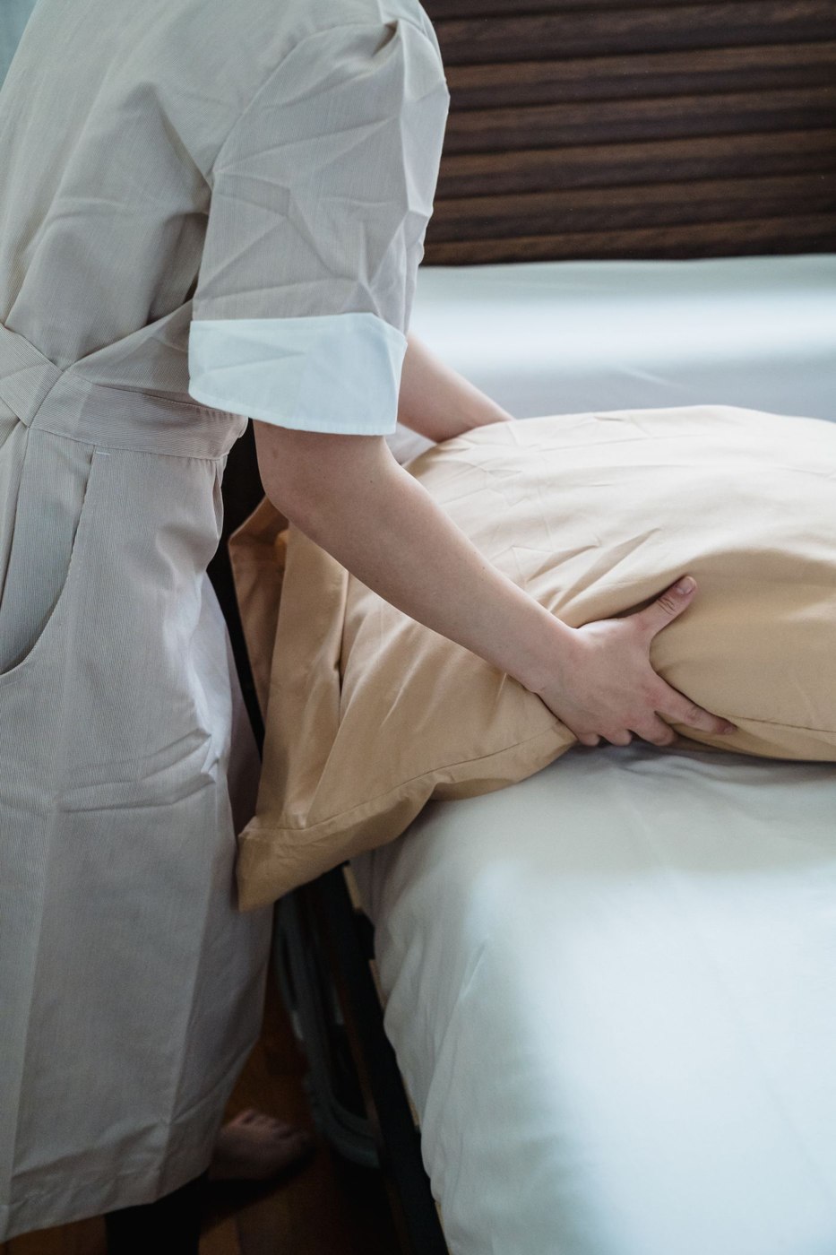 A Person Holding a Pillow