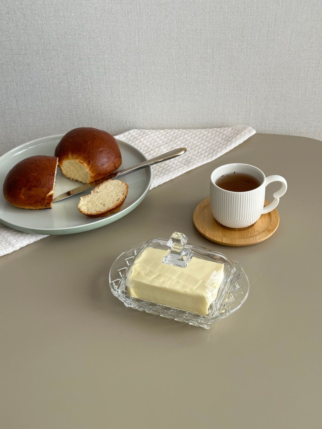Cozy Breakfast Scene with Bread and Tea