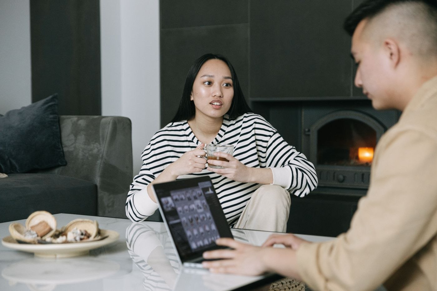 Couple Talking While Drinking Coffee