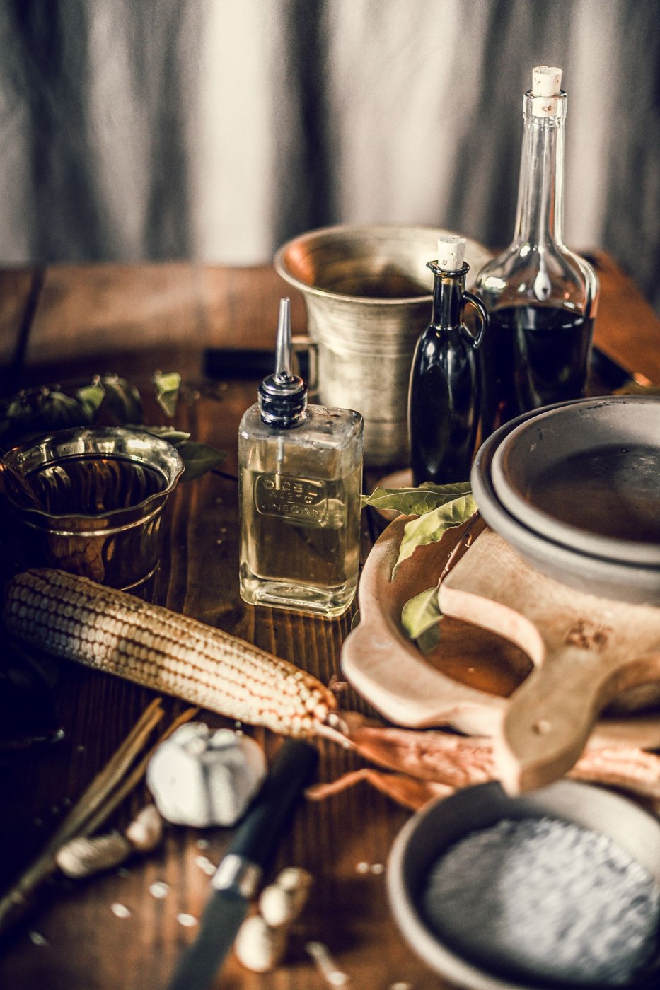 Products and utensils on table in kitchen